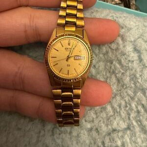 Seiko Gold-Tone Watch with Date Display